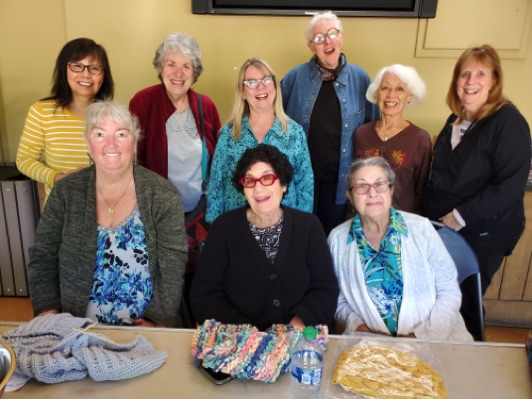 Members of the VERY productive and generous knitting group.